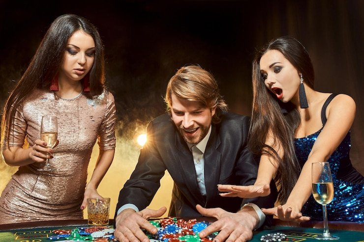 Casino Hold'em table layout on winbet777 mobile with dealer and community cards visible